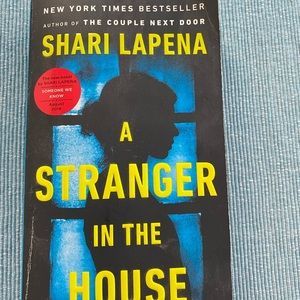 Paperback suspense novel. A stranger in the House.